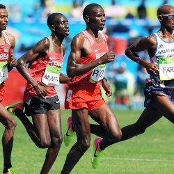 Mo Farah remains on track for double title defence despite stumble